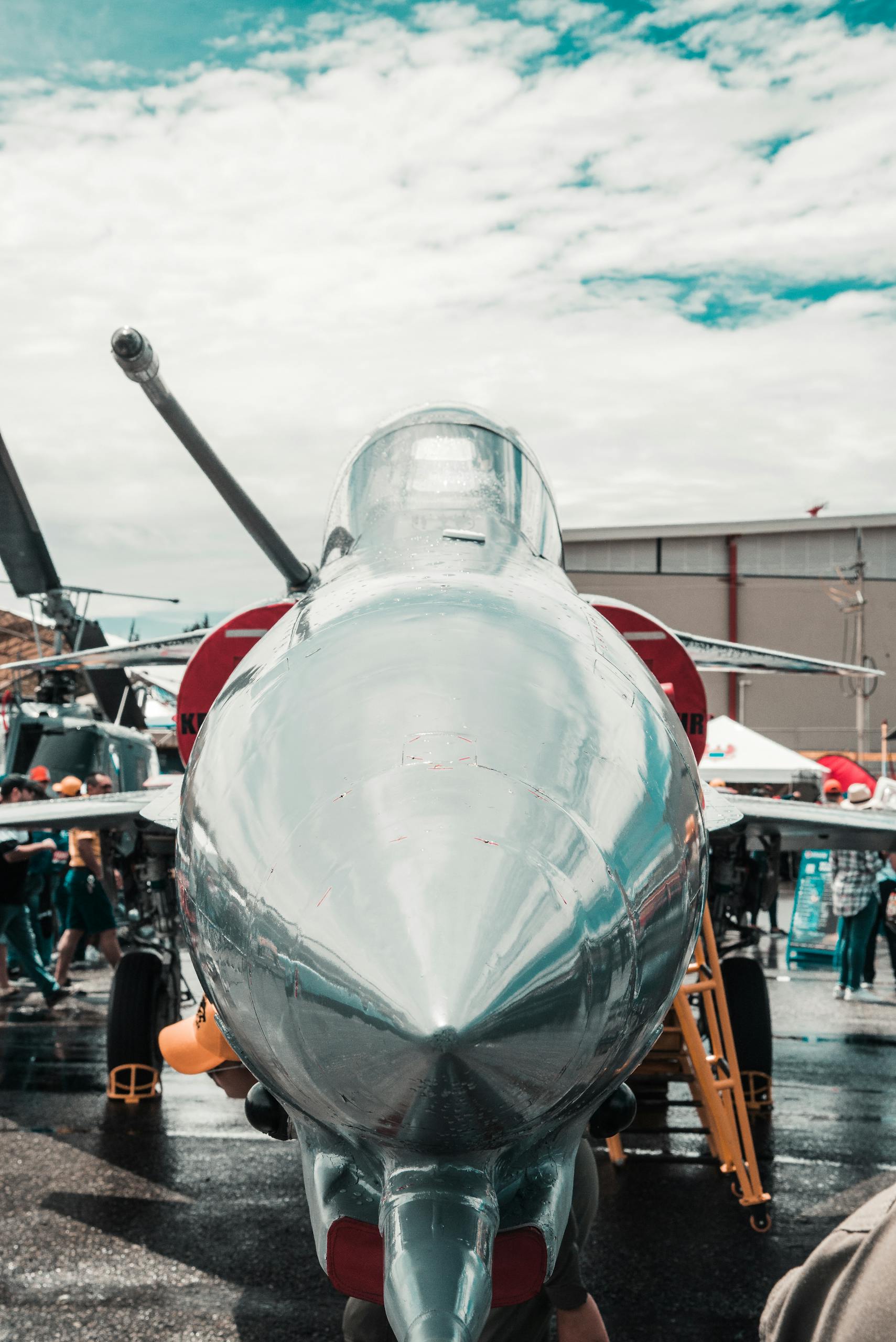 Close-up of a military jet at an open-air aviation event in Antioquia, Colombia.